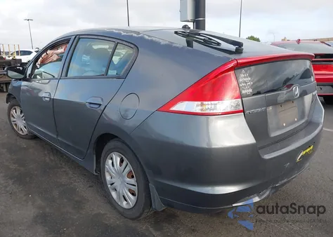 2010 Honda Insight Lx z USA, uszkodzony, nr VIN JHMZE2H5XAS038974
